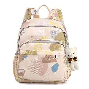 Toptan renkli baskılı büyük kapasiteli bebek bezi çantası seyahat taşınabilir anne çantası çok fonksiyonlu bebek bezi çantası sırt çantası