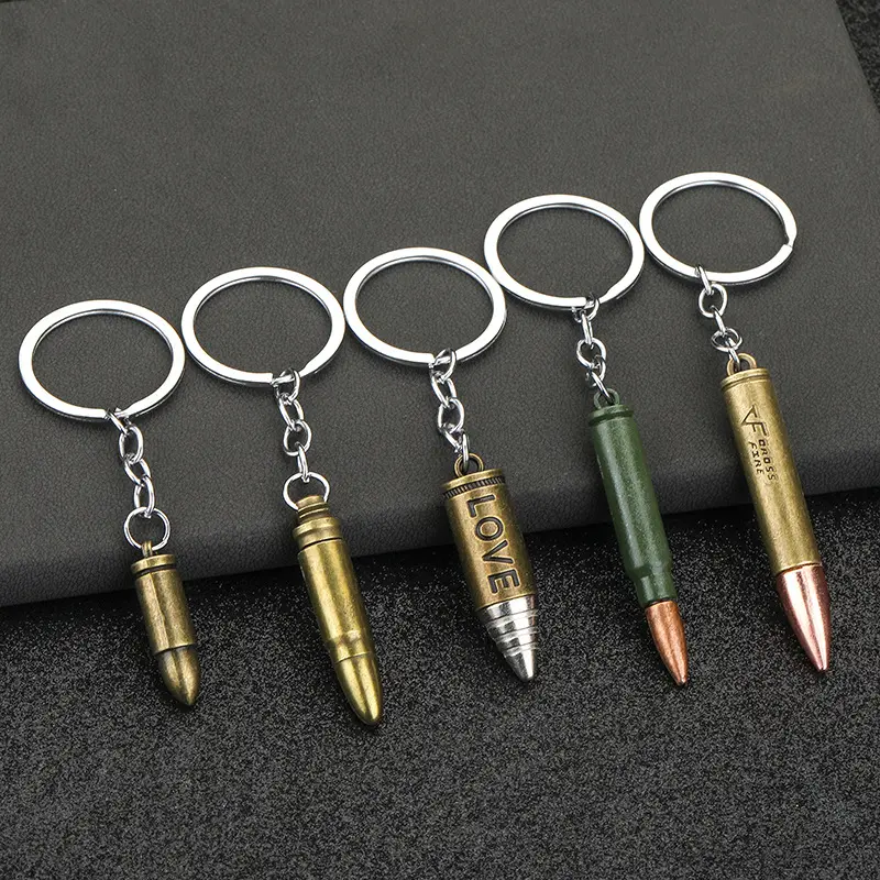 Vente en gros Cadeau promotionnel Porte-clés mini pistolet balle en métal personnalisé avec pendentif porte-clés balles modèle