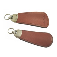Porte-clés en métal de luxe avec chausse-pied et logo personnalisé Vente en gros de cadeaux personnalisés divers porte-clés en cuir