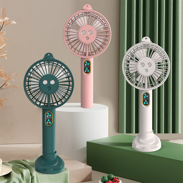 New Design 3 Speeds USB Charging Cooling Fan Handhold Mute Electronic Mini Conditioner Air Spray Fan