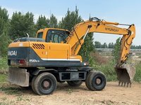 Excavatrice sur pneus Hyundai 150W-9 d'occasion de haute qualité, 15 tonnes, Cummins, modèle 2023, excellentes performances, composants principaux en stock, vente