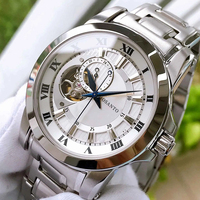 Montre Automatique Squelette Exquise à Cadran Rayé Blanc, Boîtier Poli Argenté, Bracelet Métallique Bleu, Idéale pour le Quotidien