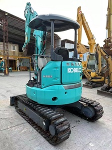Excavadora hidráulica de cadenas Kobelco Sk30sr color verde azulado con orugas y cabina para uso en construcción - Product Image 2