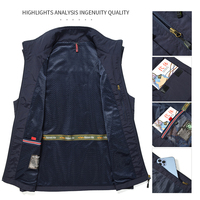 Gilet de pêcheur multi-poches pour la pêche, la randonnée, la photographie et le camping.