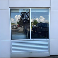 Fenêtre à persienne fixe pour hôtel au design moderne Cadre en alliage d'aluminium Porte anti-panique Devanture en fibre de verre à impact d'ouragan
