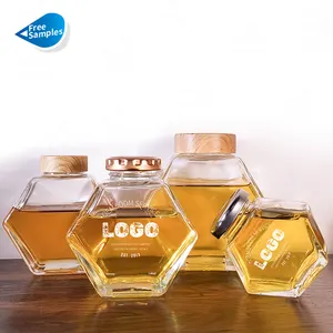 Hot bán 100ml 180ml 280ml 500ml lục giác hình dạng tổ ong mật ong container Glass mật ong Jar với nắp kim loại