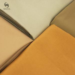 เสื้อปาร์เกอะแฟชั่นผ้าเทรนช์โค้ทผ้าโพลีเอสเตอร์ย้อมสีทึบสีกากีกันน้ำ - Product Image 2