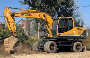 Excavatrice sur pneus Hyundai 150W-9 d'occasion, 15 tonnes, système hydraulique d'origine, matériel de construction d'occasion - Product Image 2