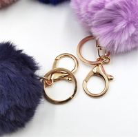 Porte-clés pompon avec pompon pour femme, accessoire à la mode, boule de fourrure rose, bouffante, bijou
