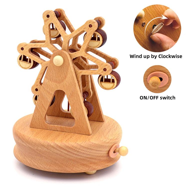 Boîte à musique en bois, couleur bois, en forme de grande roue, avec base ronde.