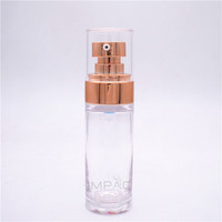 Flacon de lotion pour le visage en plastique rigide transparent rond et épais de 30 ml avec pompe dorée