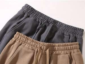 Pantalones de chándal de algodón transparente de cintura alta estilo holgado características acampanadas forma de pierna modificada personalizada ropa de calle decoración de bolsillo frente plano - Product Image 6