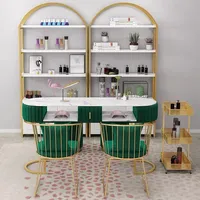 La couleur et la taille de la table de manucure en marbre velours rose de luxe peuvent être personnalisées ensembles de tables et de chaises pour ongles de meubles de beauté