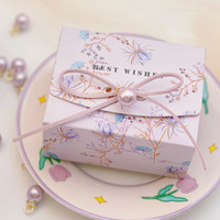 Vente en gros de boîtes d'emballage cadeau personnalisées élégantes avec nœud papillon décorées en ruban carton de qualité supérieure pour mariage et fêtes de Noël