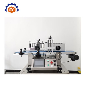 Máquina taponadora prensadora de llenado de botellas de plástico y vidrio líquido de escritorio completamente automática para aceite de bebidas - Product Image 3