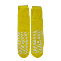 Chaussettes antidérapantes de couleur de taille de matériau personnalisée pour l'ensemble jaune de chaussettes antidérapantes de centre de soins de santé d'hôpital