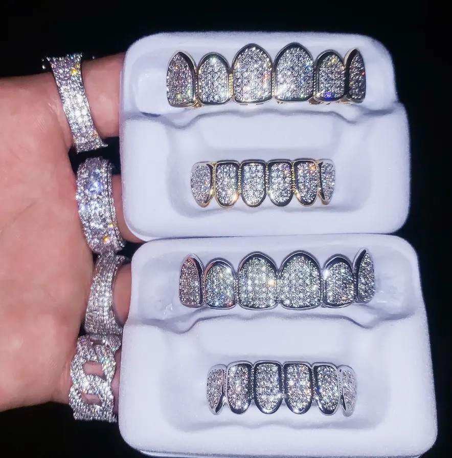 Zuanyang venda quente moda chaves para teet moda hip hop rapper dente real ouro argent chapeado dentes de aço grillz