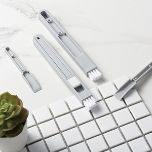 Recogedor de Polvo Portátil Multiusos 2 en 1, Herramienta de Limpieza, Cepillo para Ventanas, Cepillo para Limpiar Teclados y Puertas - Product Image 1
