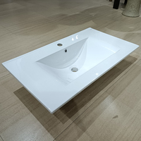 Meuble-lavabo de salle de bain en céramique blanche moderne Lavabo à main au design simple avec montage sur robinet monotrou