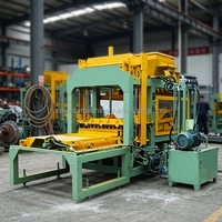 Machine de fabrication de blocs autobloquants QT6-15 sans cuisson, haute productivité, ligne de production automatique de briques en cendres volantes pour l'Afrique