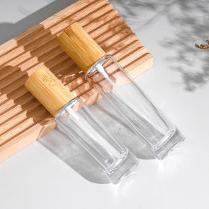 ผู้ผลิตขายส่งขวดน้ำหอมแก้วใสทรงกระบอกขนาด 30 มล. 50 มล. 100 มล. แบบหนา พร้อมฝาไม้ - Product Image 4