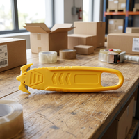 Cutter de sécurité personnalisé jaune en plastique avec crochet pour la découpe de rubans et de films, à usage unique