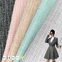 Tissu en tweed tricoté simple face de couleur unie légère et fine dans la collection printemps/été, avec un grand stock disponible