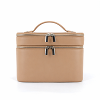 Sac de toilette de voyage en cuir PU de luxe à grande capacité avec logo personnalisé, fermeture éclair, sac à maquillage portable, étui de rangement pour cosmétiques