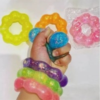 Jouet sensoriel anti-stress unisexe en TPR, design donut scintillant, pour soulager le stress, adapté aux 14 ans et plus, produit transfrontalier très vendu