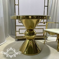 Table de mariage ronde dorée pour gâteau