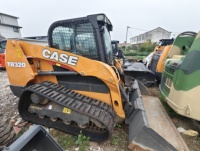 Chargeuse compacte sur chenilles TR320 avec chenilles en caoutchouc et godet pour travaux de construction