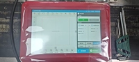 Imprimante laser volante en ligne pour le marquage de la date, du numéro de lot et du code d'expiration sur les contenants, couvercles et produits en plastique