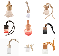 Bouteille en verre de parfum de parfum de sens de sortie de ventilateur automobile de 10ml avec le chapeau en bois et la bouteille de diffuseur de voiture d'agrafe d'évent en métal