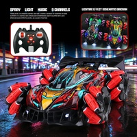 Voiture Télécommandée Stunt RC 2,4 GHz 4x4, Musique et Lumières, Rechargeable, Commande Geste, Effet Brouillard Coloré, pour Courses Tout-Terrain