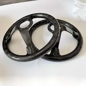 <span class=keywords><strong>Volant</strong></span> automobile en fibre de carbone personnalisé en usine et nouvellement conçu avec feuille <span class=keywords><strong>d</strong></span>'or - Product Image 1