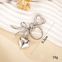 Porte-clés breloque de sac plaqué argent, motif chien ballon mignon et pendentif cœur, avec chaîne, pour décoration de sac à main femme, vente en gros
