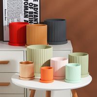 Vente en gros Pots de fleurs cylindriques d'intérieur en céramique colorés Pot en terre cuite Plateau Argile Cactus Jardinière Décoration intérieure Design Pack Jardinage