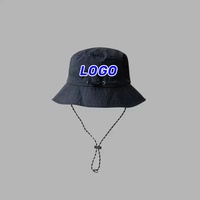 Topi memancing pria Sporty uniseks, kustom cetak luar ruangan topi ember tepi lebar bernapas kain Herringbone gaya Camo grosir