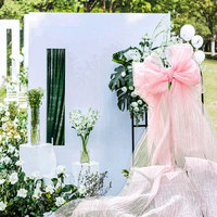 Grand nœud en organza rose de luxe pour la décoration visuelle des vitrines et des événements