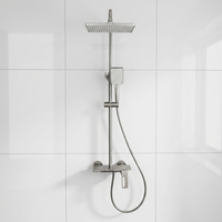 Ensemble de douche pluie moderne en laiton à poignée unique avec finition polie, barre coulissante murale et cartouche céramique, idéal pour appartements et hôtels