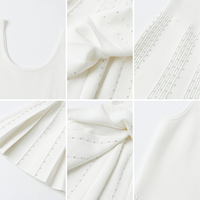 Nouvelle Robe Tricotée Élégante Blanche Perlée et Ajourée à Col U Sans Manches Coupe Slim Printemps 2026 – Tendance Femme pour Tenue Décontractée ou de Soirée