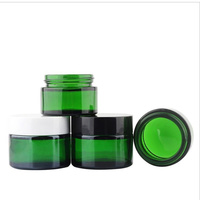 Pot de crème cosmétique de 30ml(1 oz) en verre vert vide et rechargeable avec bouchon noir pour crème pour le visage baume à lèvres