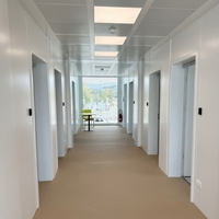 Conteneur plat étanche de 40 pieds, maison commerciale multi-usage pour hôpital, salle de sport, bar, boutique et centre d'affaires temporaire