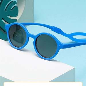 Lunettes de soleil pour bébé garçon et fille tendance 2024, en silicone, UV400, rondes, polarisées, avec sangle - Product Image 1