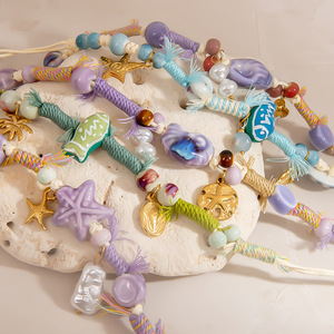 สร้อยข้อมือทอแบบศิลปะ ลายเซรามิก ซีรีส์มหาสมุทร สไตล์โบฮีเมียน สำหรับผู้หญิง ของขวัญ เครื่องประดับ ดีไซน์ปลาดาวและเปลือกหอย - Product Image 1