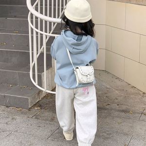 กระเป๋าสะพายข้างทรงใหม่แบบมินิ รุ่น Rivet Crossbody  ใส่ลิปสติกได้  กระเป๋าสะพายไหล่เด็ก  กระเป๋าสะพายไหล่แฟชั่นทันสมัยน่ารักสำหรับสาวๆ - Product Image 5