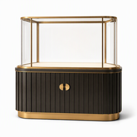Comptoir de présentation de bijoux sur mesure en gros avec base métallique, vitrine en verre et éclairage LED