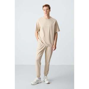 Conjunto Deportivo Básico Air Jones para Hombre, Corte Holgado, Sudadera y Pantalones de Algodón Beige Texturizado, Grueso y Suave - Product Image 1