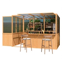 Serre en polycarbonate incliné avec comptoir de bar intégré, pour jardin d'hiver extérieur, abri pour plantes, servant également de véranda ou de jardin d'hiver.