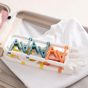 Perchero Multifuncional de Plástico para el Hogar con Gancho Giratorio, Colgador de Pañales de Plástico con 12 Pinzas Extraíbles - Product Image 5